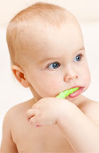 Baby brushing teeth